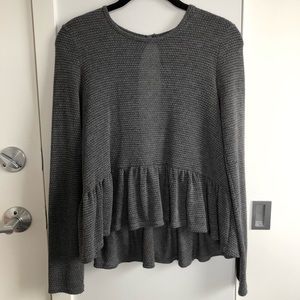 Peplum gray long sleeved top
